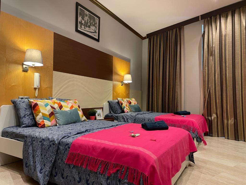 By La Rambla Rooms