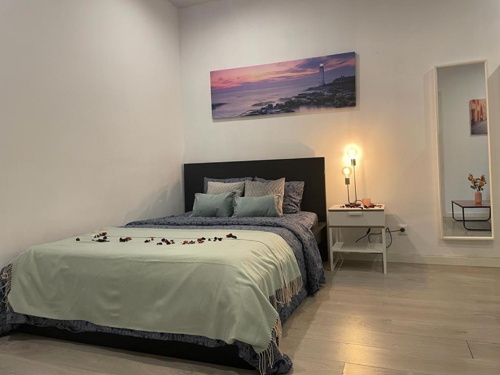 By Plaza Universidad Hostal