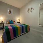 By Plaza Universidad Rooms